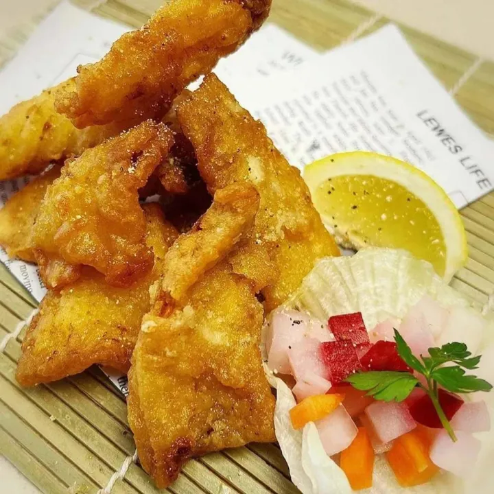 Crispy battered fish with lemon